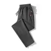Pantalones de chándal de verano y primavera para hombre marca de moda rectos holgados pantalones deportivos para hombre overol talla grande pantalones casuales tobilleros para hombre