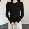 Camiseta de manga larga básica minimalista versátil de color liso ajustada para mujer, temporada primavera/otoño 2026, top base para prendas de abrigo