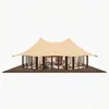 Tienda de glamping de alta gama con techo de doble cumbrera para zonas de turismo cultural, con ventanas panorámicas de suelo a techo, adecuada para campamentos de tiendas tipo casa de huéspedes