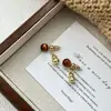 Brincos Vintage de Outono e Inverno Maillard Novo Estilo Chinês Imitação Pedra Olho de Tigre Cabacinha Nicho Luxo Leve High-End para Mulheres