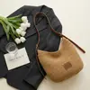Bolsa de ombro trançada estilo coreano para mulheres, novo modelo 2026, bolsa de ombro de tricô, estilo casual de férias na praia, bolsa de palha para o dia a dia