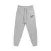 Pantalones Largos Casuales Unisex con Estampado de Letras Logo y Cordón Estilo Básico Tinta Salpicada Ropa de Pareja