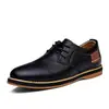 Origen y suministro de zapatos casuales de cuero de dos capas para hombre de temporada, zapatos de hombre casuales, zapatos de hombre de moda estilo británico, venta al por mayor