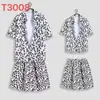 Hawaii Seaside Beach Holiday terno masculino solto plus size casal moda marca camisa de manga curta casual conjunto de duas peças