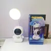 Lámpara de Mesa Astronauta Creativa LED Protección Ocular Recargable Lámpara de Mesa Dormitorio Estudiante Lectura Lámpara de Mesa Pequeña