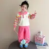 Conjunto deportivo para niña para primavera y otoño 2026, modelo nuevo, sudadera a rayas para bebé niña y pantalón de chándal para niños, conjunto de dos piezas