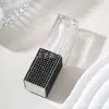 Venta caliente transfronteriza creativo con incrustaciones de diamantes lápiz labial brillo de labios sub-embotellado botellas pequeñas cosméticos portátiles paquete de viaje fabricantes al por mayor
