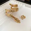 Pulseira Aberta Banhada a Ouro 18k com Zircônia em Formato de Cobra Leve Luxo Sensação de Alto Padrão Pulseira de Nicho Versátil Atacado Mulheres