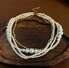 Colar de Pérolas de Design de Nicho de Luxo Leve Francês Que Não Desbota no Verão, Corrente de Clavícula Elegante e Personalizada para Empilhamento de Verão na Beira-Mar