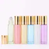 Botella de vidrio con roller de 10 ml de color para venta al por mayor, botella go ball, botella de vidrio, botella vacía, botella para aceite esencial, botella de perfume de vidrio, botella
