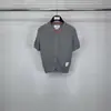 Venda Direta da Fábrica Tb Verão Novo Gola Redonda Manga Curta Estampa Ondas de Água Feminino Casual, Confortável e Versátil Botão Manga Curta