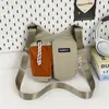 Color-blocking casual múltiplos bolsos 2026 verão novo estiloso chique esportivo simples versátil bolsa de ombro única transversal hip