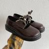Saia estilo francês vintage sola grossa sapatos pequenos de couro sapatos femininos 2025 novos sapatos de boca rasa com laço primavera e outono Mary Jane