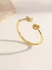 T familia versión alta transfronterizo nuevo producto venta caliente conjunto de anillo de pulsera abrible joyería de mano de lujo ligero retorcida incrustada de diamantes
