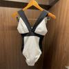 Roupa de banho transfronteiriça 2022 nova versão coreana do biquíni sexy preto e branco decotado nas costas fino com alça maiô feminino atacado