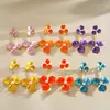 Pendientes de botón de acero con flor de gota de aceite de perla transfronterizos europeos y americanos, pendientes exagerados simples y dulces, pendientes para mujer de lujo ligero y de alta gama