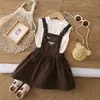 Conjunto sin mangas de estilo coreano para trabajo para niños pequeños, nuevo conjunto de dos piezas de verano 2026 con falda de tirantes fina y pantalones para niñas