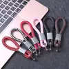 Colgante de llave con logo de coche de cuerda trenzada creativo nuevo para hombre, llavero de herradura para colgar en la cintura, pequeños regalos para hombres y mujeres