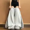 Pantalones deportivos retro americanos de tres rayas para mujer, otoño 2026 nuevos de cintura alta, adelgazantes, holgados, casuales, con pierna ancha curva