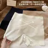 Pantalones cortos de seguridad y ropa interior dos en uno estilo verano fino para mujer anti-exposición seda de hielo sin costuras nuevo 2026 pantalones de capa base para niñas