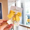 Estilo coreano floral em relevo clipe de boca arco fresco 2 peças menina clipe lateral simples grampo de cabelo pai-filho