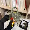 Bolso de mano tipo concha de moda transfronteriza fresco y dulce para mujer, nuevo de otoño 2026, bolso de hombro cruzado de lunares de lujo ligero