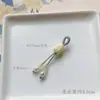 Precio mayorista directo de fábrica pulsera hecha a mano pulsera con colgante diy accesorios pequeños deslizantes colgante de garra de gato lindo Joker