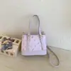 Bolsos de Moda Transfronterizos de Nicho Estampados para Mujer 2026 Nueva Moda Bolso Cruzado Versátil Bolso de Mano Exquisito Bolso Cubo
