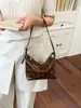 Bolso cruzado de un solo hombro de moda y con estilo 2026 transfronterizo, textura simple, nueva tendencia de verano, bolso único tipo empanada para mujer