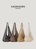 Bolsa de playa de malla hueca de verano para vacaciones junto al mar, casual y a la moda, nuevo diseño único de nicho, bolso de hombro para madre e hijo