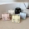 Mochila transfronteiriça estilo coreano com laço para mulheres, novo modelo 2026, simples e elegante, bolsa quadrada pequena de alta aparência, mochila multifuncional