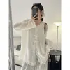 Cardigan de Tricô Floral Renda Nova Francesa Vazado Feminino 2026 Início do Outono Super Emagrecedor Estilo Chinês Botão de Sapo Manga Longa