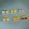 Mini Clipes de Orelha Osso Dourados com Rosto Sorridente Rosqueados Doces e Mais Fáceis de Combinar Aço Titânio Brincos Femininos Joias de Comércio Exterior Brincos Venda Direta Atacado