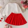 Nueva colección de primavera y otoño de ropa infantil para niñas: top de manga larga con estampado de fresas y falda plisada, perfecto para vacaciones y cumpleaños
