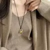 Collar minimalista de cordón de cuero estilo coreano con colgante ovalado, diseño único, cadena versátil para suéter, gargantilla diaria para mujeres