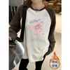 Camiseta feminina de veludo alemão com gola redonda e manga longa, cores combinadas, outono e inverno 2024, nova, design solto e casual, sensação de peça básica