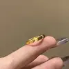 Loja de Ouro Mesmo Estilo Areia Dourada Anel Olho de Gato Cintilante Anel Liso Anel para Homens e Mulheres Anel de Casal Design de Nicho Acessórios Simples