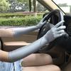 Guantes de Spandex para Mujer Mangas Largas Elásticas Etiqueta Blancos para Conducir Protección Solar Mangas para los Brazos Exterior Fabricante Venta al por Mayor