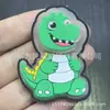Parche de goma de PVC de dinosaurio popular más vendido, lavable, divertido parche para zapatos y sombreros para niños