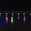 Suministro directo de fábrica luces LED llavero de cristal luces de colores luces monocromáticas rojo amarillo azul verde rosa morado luz blanca
