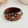 Pulsera redonda de remache de flor de resina y madera transfronteriza europea y americana, pulsera de estilo vintage francés, joyería con sensación de lujo ligero y alta gama