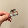 Pinza de pelo pequeña con garra para temperamento de princesa, pinza de pelo lateral estilo coreano exquisita, sensación de alta gama, nuevo pinza de pelo para media coleta 2026