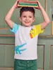 26 Camisetas de Manga Corta para Niños Moda Europea y Americana Estampado de Dinosaurio Camiseta de Cuello Redondo Estampado de Dinosaurio Sudeste Asiático Suministro Transfronterizo