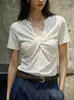 Camiseta de manga corta con cuello en V, de alta gama, a la moda, estilo europeo para mujer, nuevo diseño de verano con detalle retorcido, corte ajustado, top de hombro normal