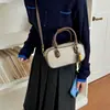 Bolsa pequena quadrada texturizada da moda deste ano para mulheres, nova coleção outono 2026, bolsa de ombro simples color block, bolsa transversal para o dia a dia