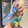 Nova boneca de sapo de óleo de desenho animado garrafa de areia movediça flutuante pingente de pirulito chaveiro de mochila de casal pequeno presente