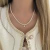 Exquisito collar de perlas de amor para mujer, estilo nicho de moda, diseño de alto nivel, cadena de clavícula, elegante collar de celebridad francesa.