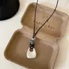 Nuevo collar con colgante de gota de agua de plata estilo coreano, sensación de lujo ligero y alta gama, cadena para suéter, moderno, simple, nicho, gargantilla versátil