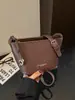 Bolso tipo cubo de alta gama para mujer, moderno y sencillo, popular este año, versátil, elegante y exquisito, adecuado para ir al trabajo y como bolso cruzado