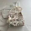 Nova bolsa de ombro bordada estilo chinês para mulheres 2026 novo estilo étnico moderna versátil bolsa transversal tipo balde